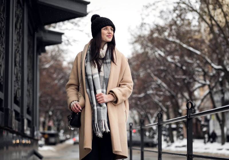 woman walking street coat face | winter wear ideas curvy