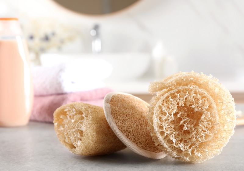 natural loofah sponges on table bathroom | spring cleaning checklist printable