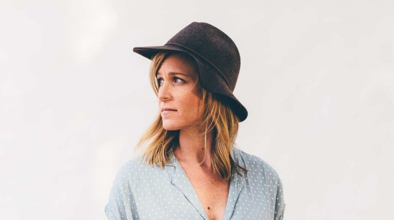 fn_BT9fwg_E-woman wearing white and blue polka dot button up cap sleeved shirt-Haircuts for Older Women-us-feature