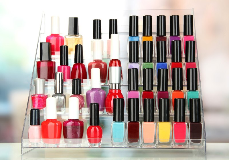 bright nail polishes on shelf beauty | kardashian makeup organizers