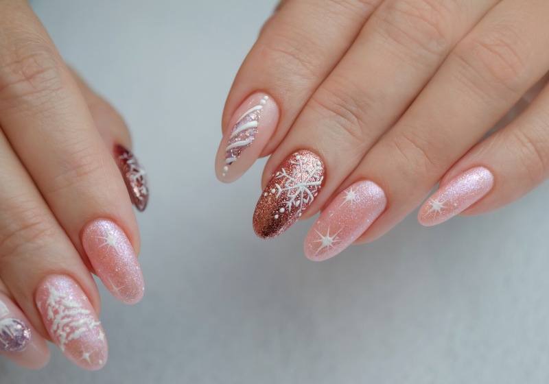 hand young woman pink manicure design | snowflake nail art step by step