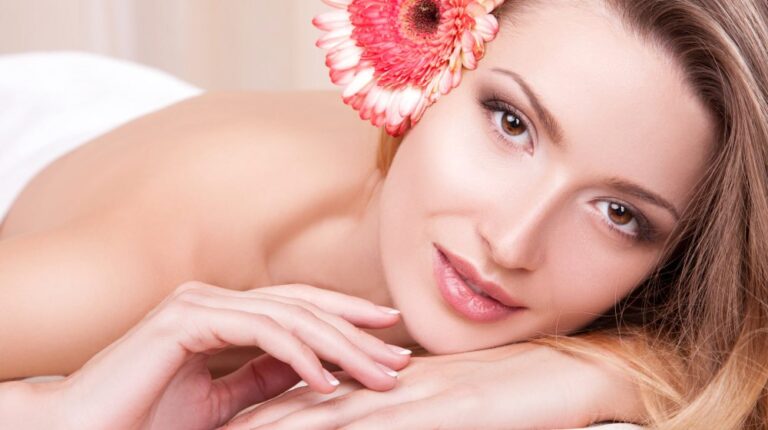 Beautiful girl with a flower in her hair in the spa | Valentine's Day Skin Care Tips For A Fresh & Glowing Skin Before Date Night | skincare tips | Featured