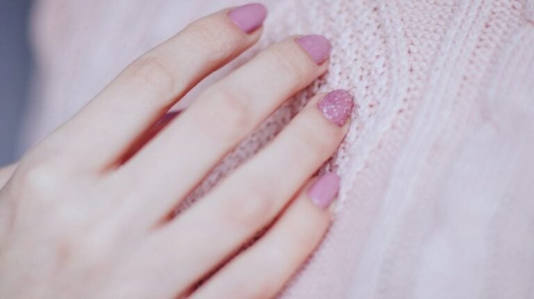 Woman With Pink Manicure | Kylie Jenner Keeping Nails, Hair & Lashes Natural During Lockdown