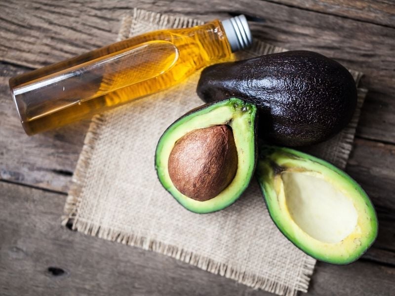 Avocado Halves Oil Bottle | Coconut Oil Recipe | Homemade Tanning Oil Recipes That Will Get You Ready For Summer | tanning oil diy