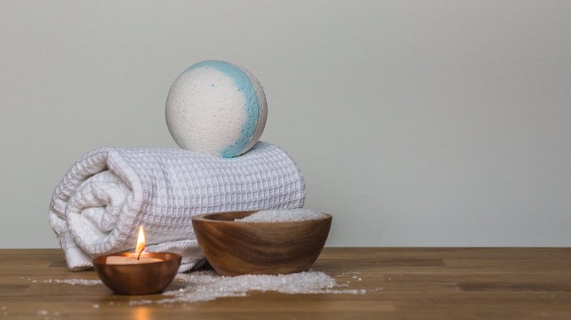 Photo Of Towel And Bath Bomb Near Candle | Self Care Products For Skin, Hair and Nails At Home | self care diy