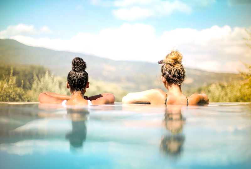 two women in swimming pool colored hair | Freshly Applied Colored Hair Care Tips|colored hair