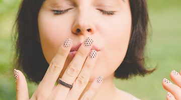 Woman Kissing Her Left Middle Finger |Easy Polka Dot Nails at Home Using A Bobby Pin | cute polka dot nails | Featured