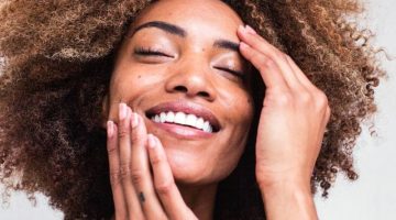 beautiful black woman smiling | Best Clean And Vegan Skincare Brands You Didn't Know About | Featured