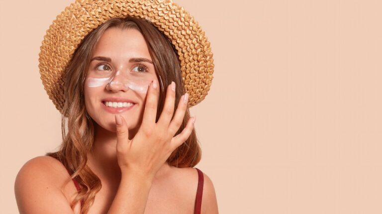 girl applying sunscreen | Best Tinted Sunscreens Worth Investing This Summer | featured
