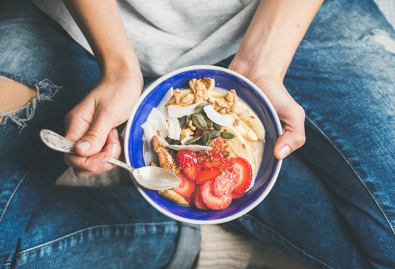 eating healthy breakfast bowl yogurt granola | Underrated Fall Skincare Hacks To Try This Season