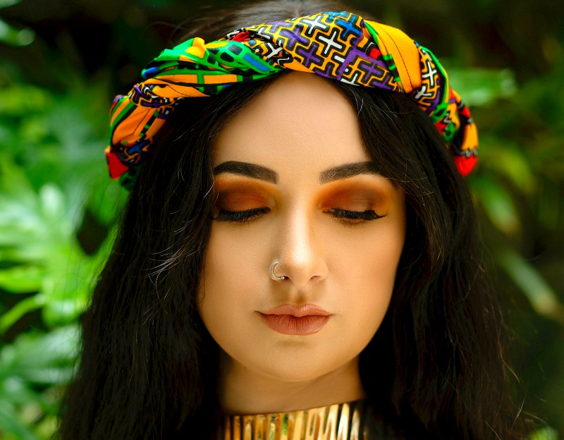 woman wearing a head scarf | Best matte eyeshadow palette for brown eyes