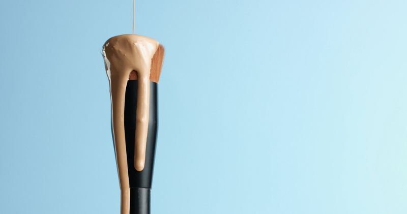 pouring-bb-cream-foundation-on-bristles | Essential ## Face Brushes You Need In Your Makeup Arsenal | Best face brush
