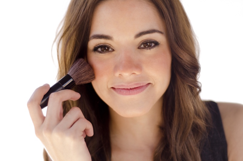 young-beautiful-brunette-applying-blush | Everyday Natural Makeup Tutorials