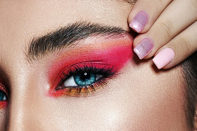 close up photo of woman with pink eyeshadow | eyebrow tutorial