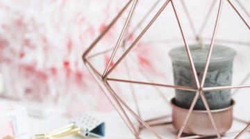 selective focus photography of candle in pink ornate holder | Easy DIY Scented Candles For Your Cozy Vanity Corner | Featured